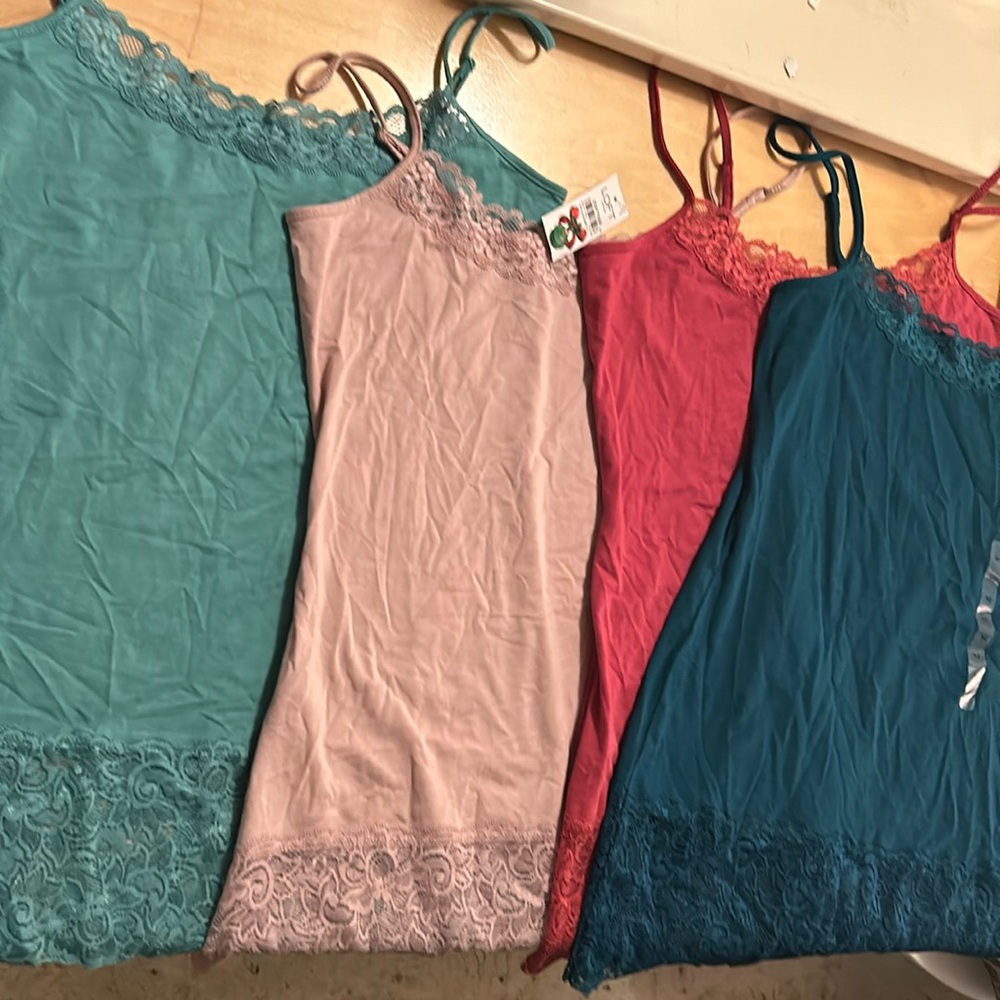 4 tank tops all new with tags /medium
